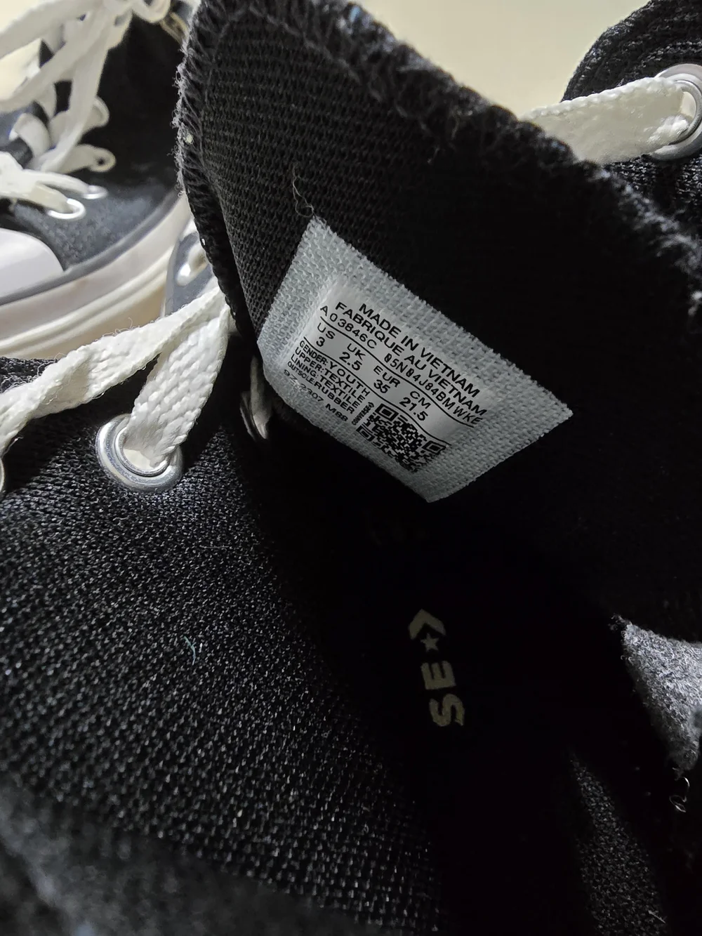 Converse Black and White High-Top Sneakers